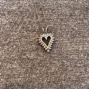 Hurdles Jewelry heart diamond necklace on silver chain.